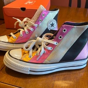 New pair of converse, with the tags on, womens size 7.5, selling for 50 dollars